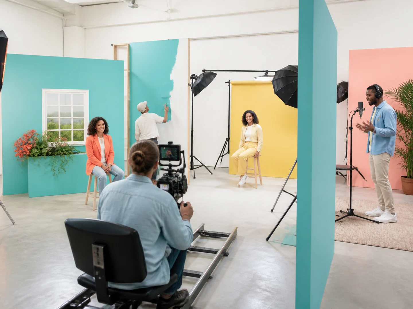 A bright studio organized around focused video production tasks